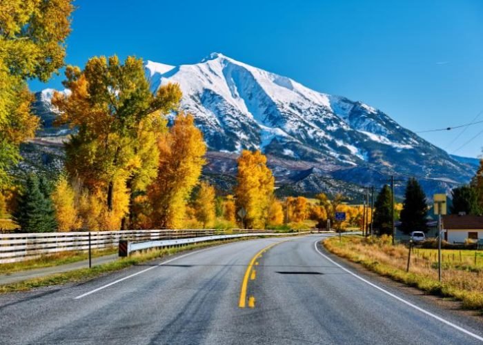 highway-in-colorado-rocky-mountains-at-autumn-2026-03-09-23-13-56-utc